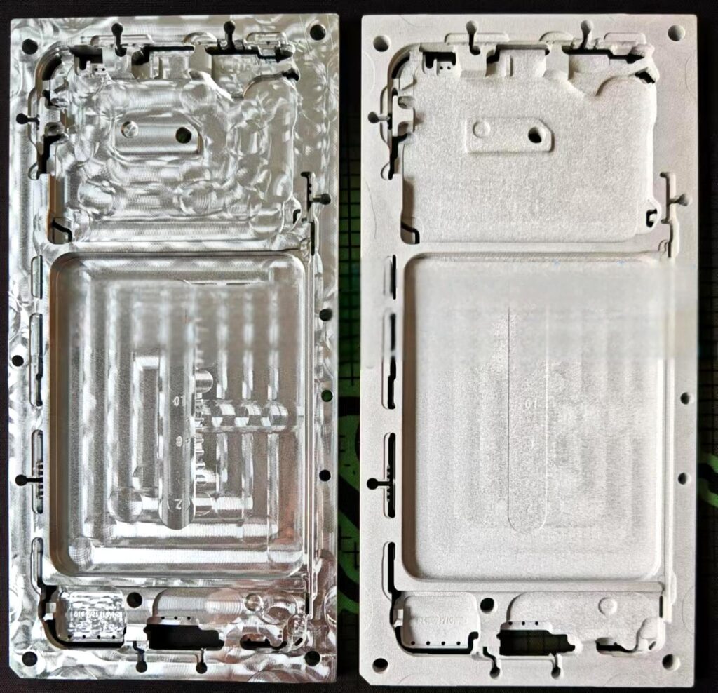 Two metal plates, used in manufacturing or prototyping, are shown side-by-side. One plate shows intricate etched or machined details, while the other is smoother.
